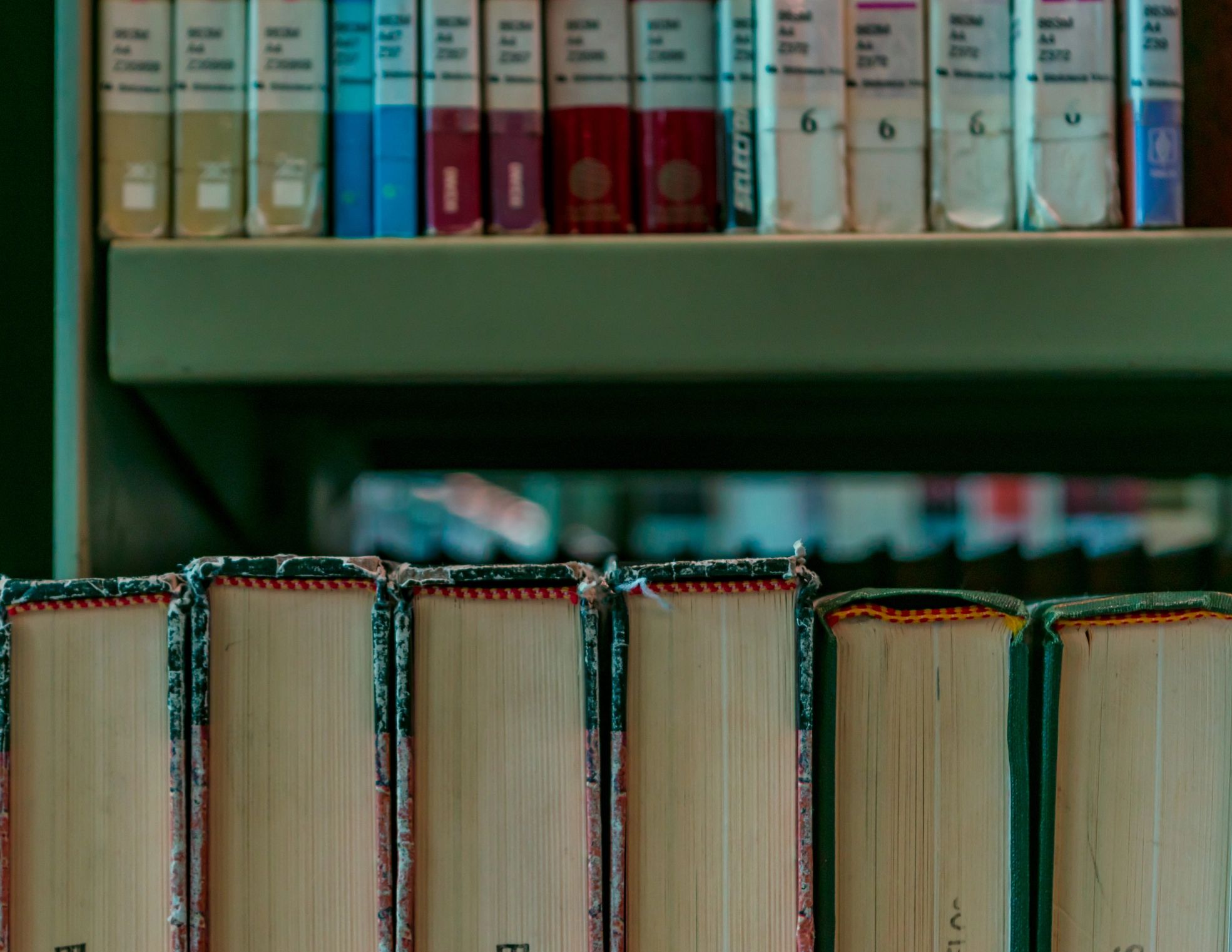 Library shelves suggesting book design and publishing craft
